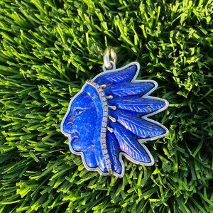 Carved Lapis Native American headdress pendant set in sterling silver